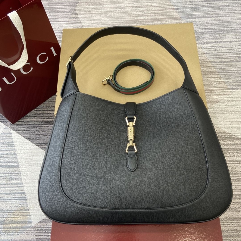 G*u*i top handle bags